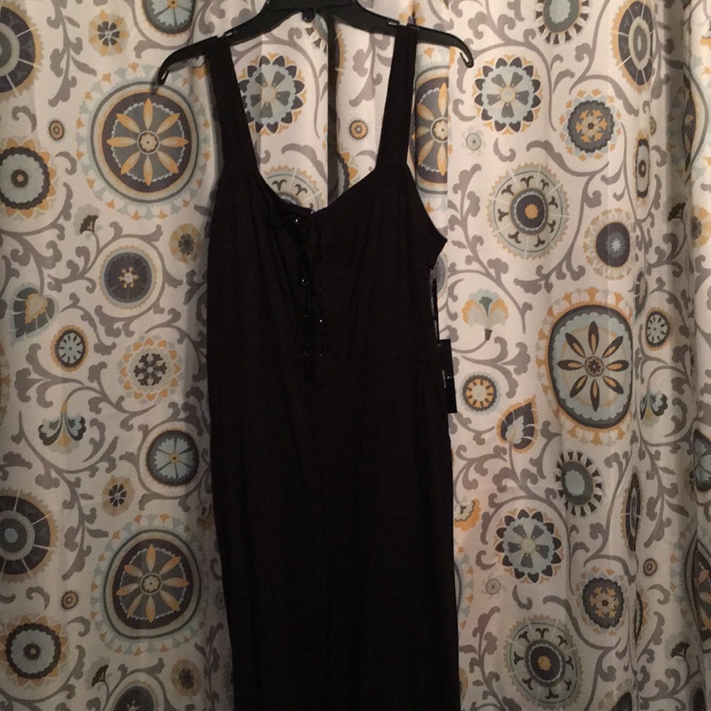 Black jumpsuit with tie up detail and wide leg